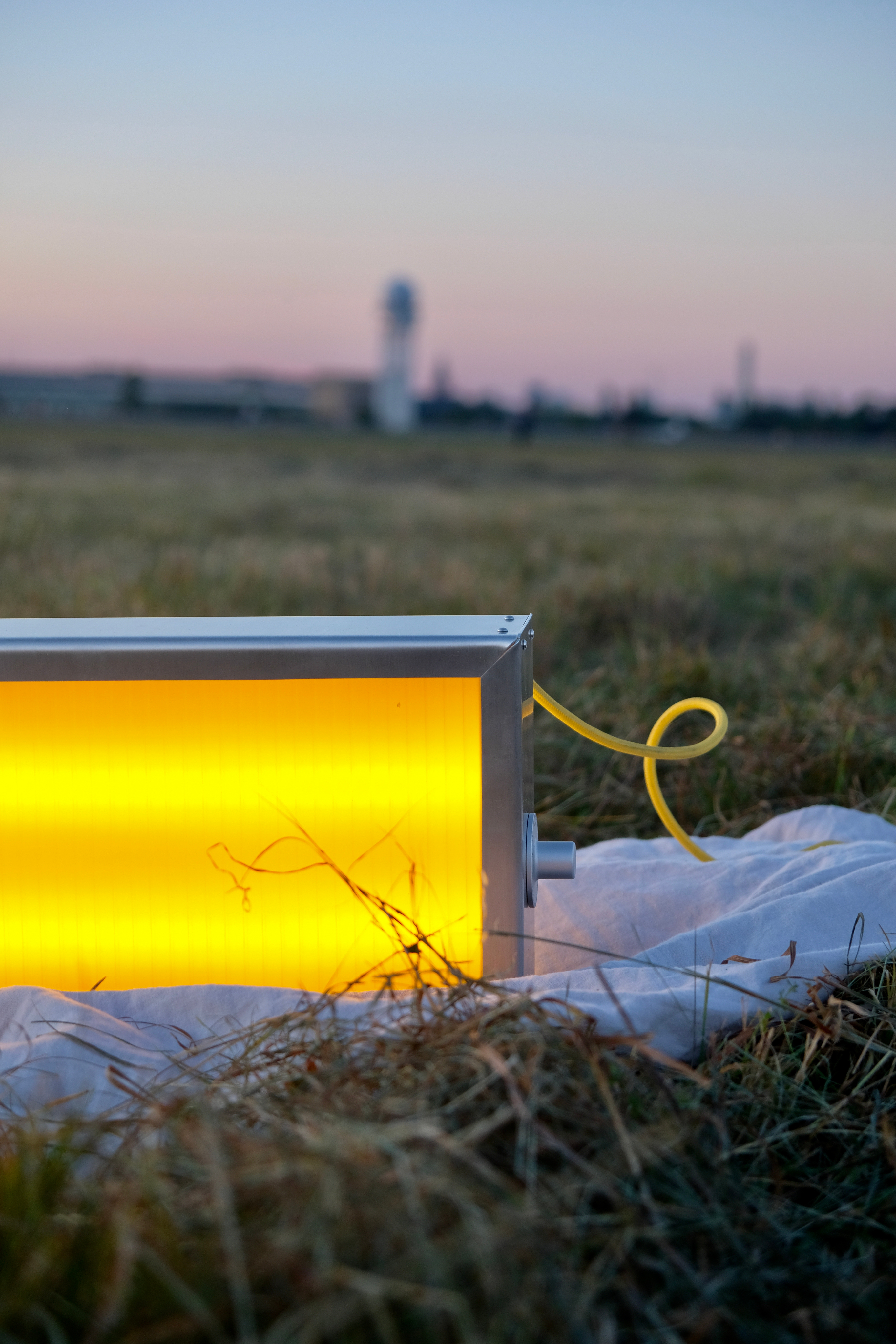 Woman with sunglasses walking down runway