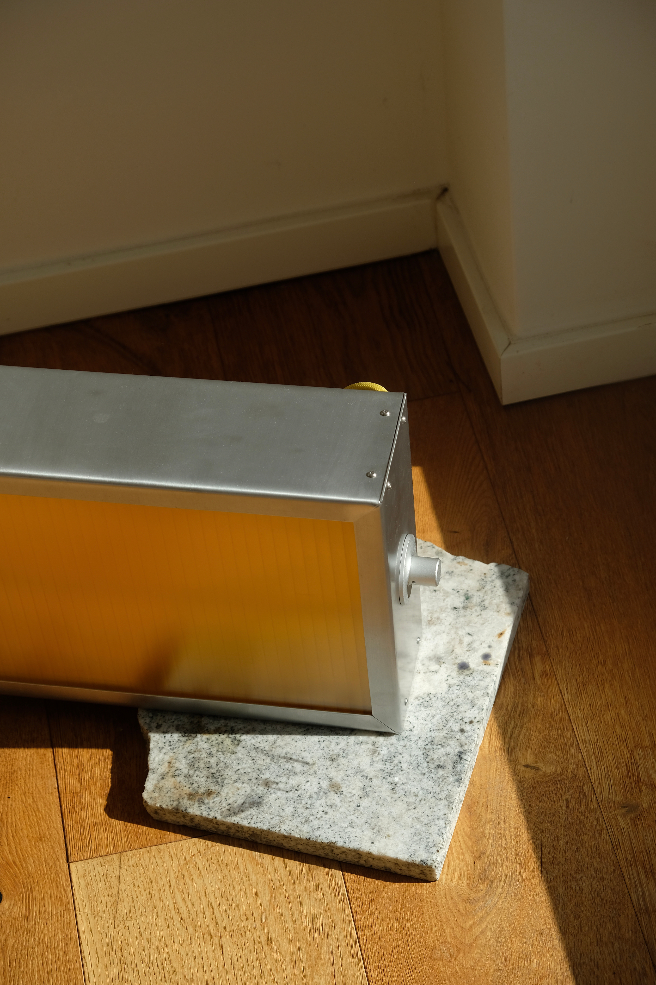 Woman with sunglasses walking down runway