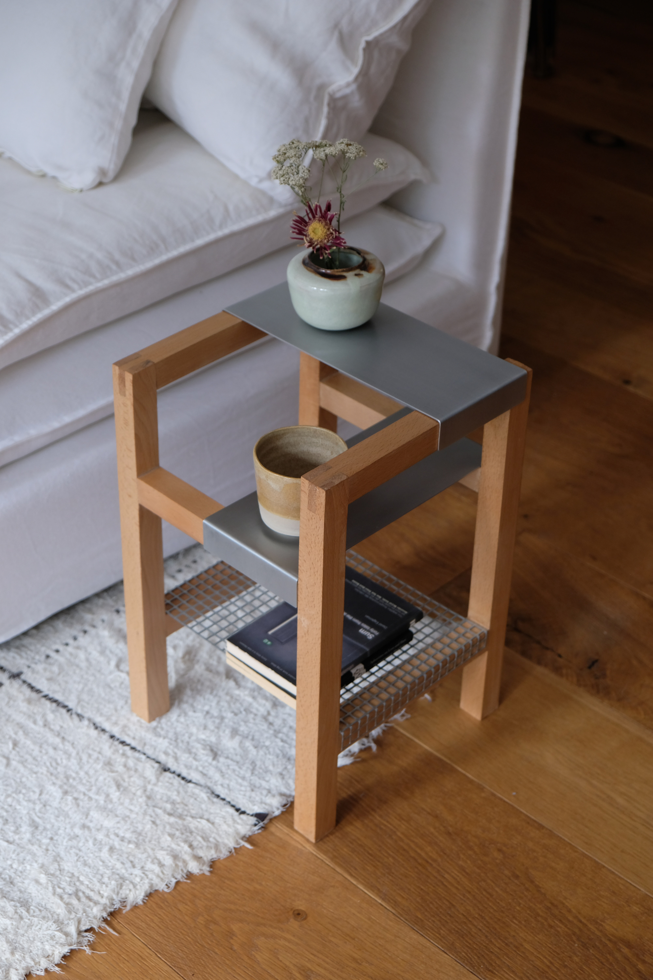 Woman with sunglasses walking down runway